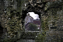 [ photo: Village Houses Through Nunney Castle Ruins, Nunney, Somerset, England UK, Jan 2006 (img 108-17&18) ]