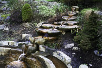 [ photo: Mandorla Pools Fountain at Chalice Well, Glastonbury, Somerset, England UK, January 2006 (img 109-011) ]