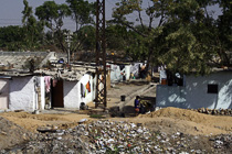 [ photo: On the Way to Ajmer, Houses and Garbage, Rajasthan, India, February 2010 (img 182-089) ]
