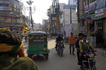 [ photo: Kashi Streets, from Bicycle Rickshaw 1, Varanasi, Uttar Pradesh, India, February 2010 (img 197-016) ]